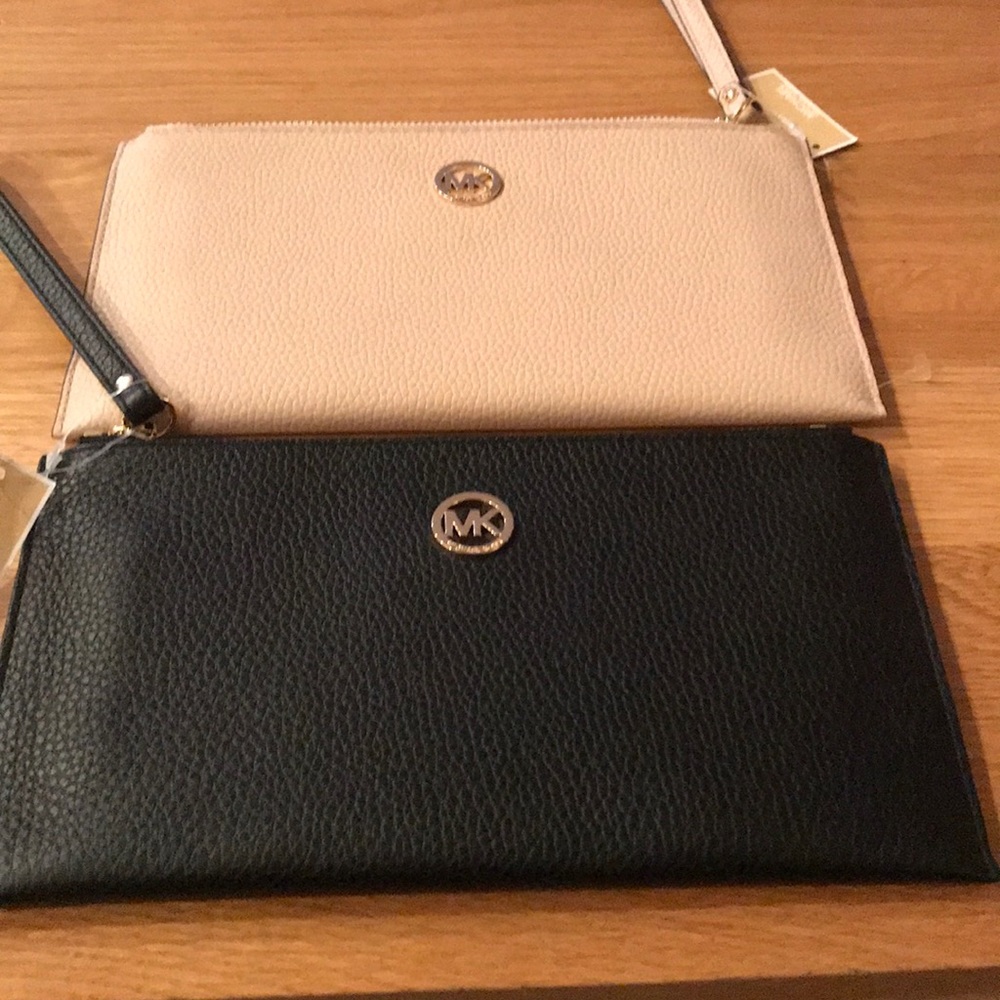Large Michael Kors Fulton wallet.